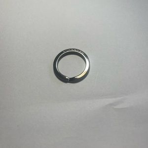 Burberry authentic ring to hold keys or purse charm. Dark metal